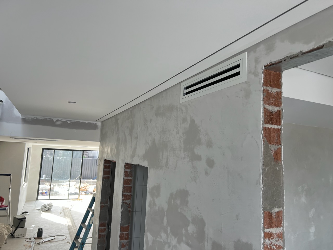 Wall mounted air conditioning duct installed in a home on the Central Coast